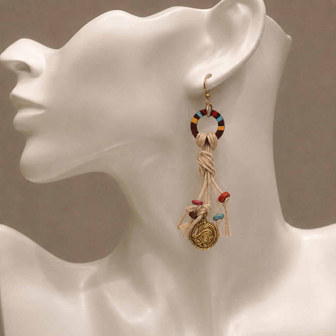 Rustic Loops: Handcrafted Wooden Earrings with Intricate Brass Figures