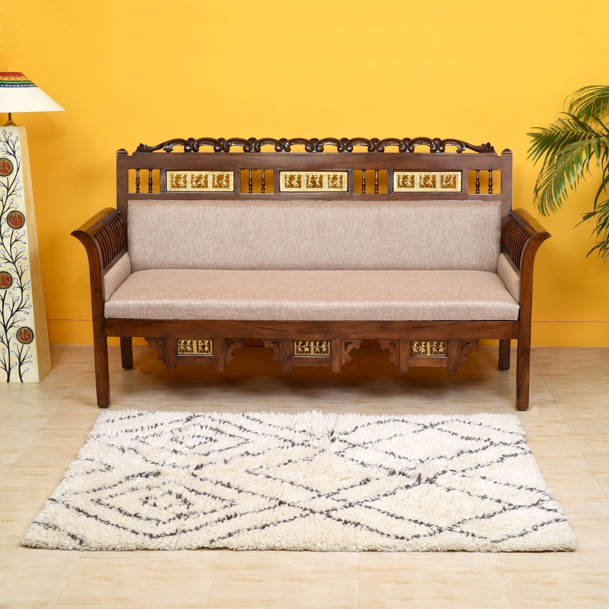 Maharaja Three Seater Sofa in Teakwood with Walnut Finish adorned with Dhokra Brass Frames