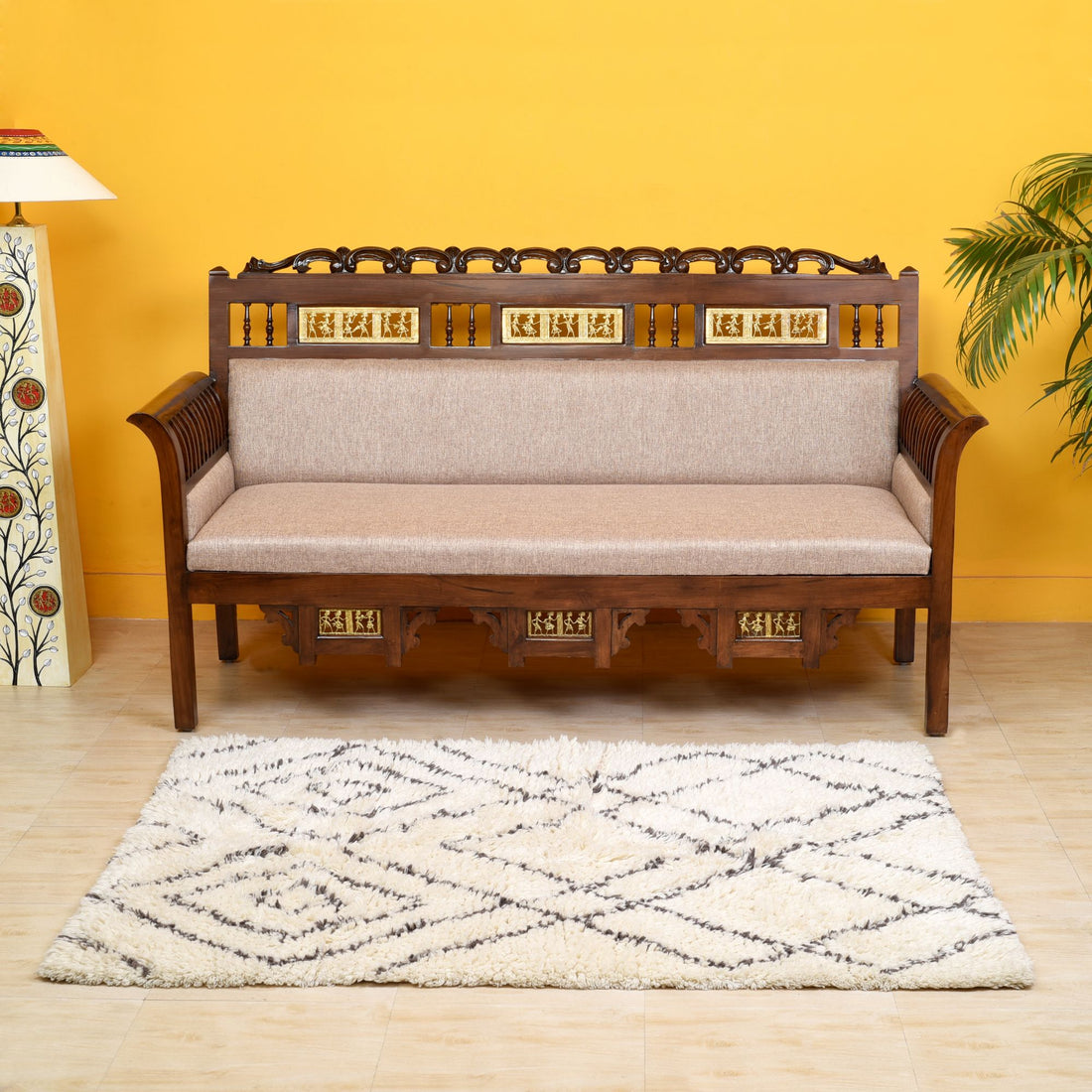 Maharaja Three Seater Sofa in Teakwood with Walnut Finish adorned with Dhokra Brass Frames