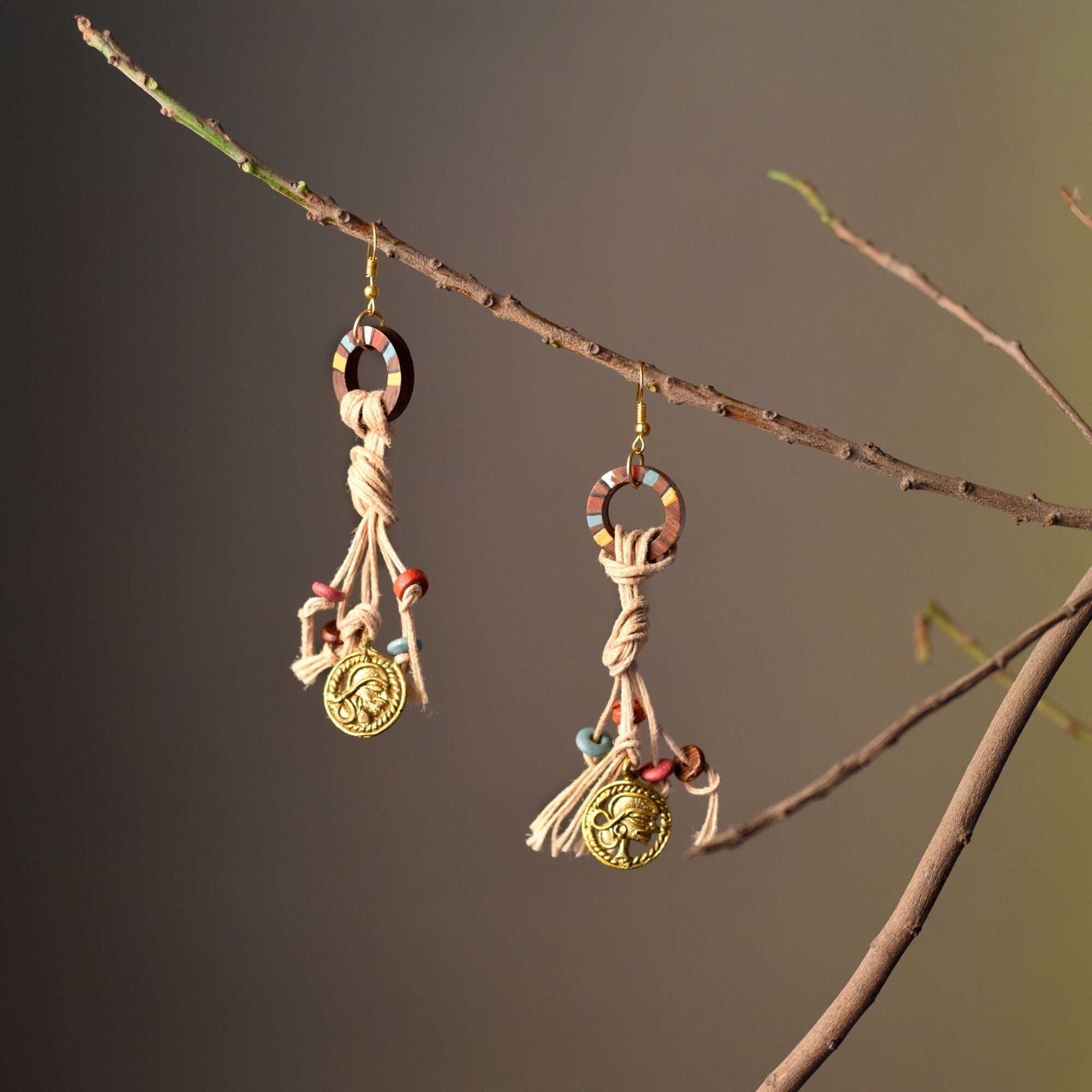 Rustic Loops: Handcrafted Wooden Earrings with Intricate Brass Figures