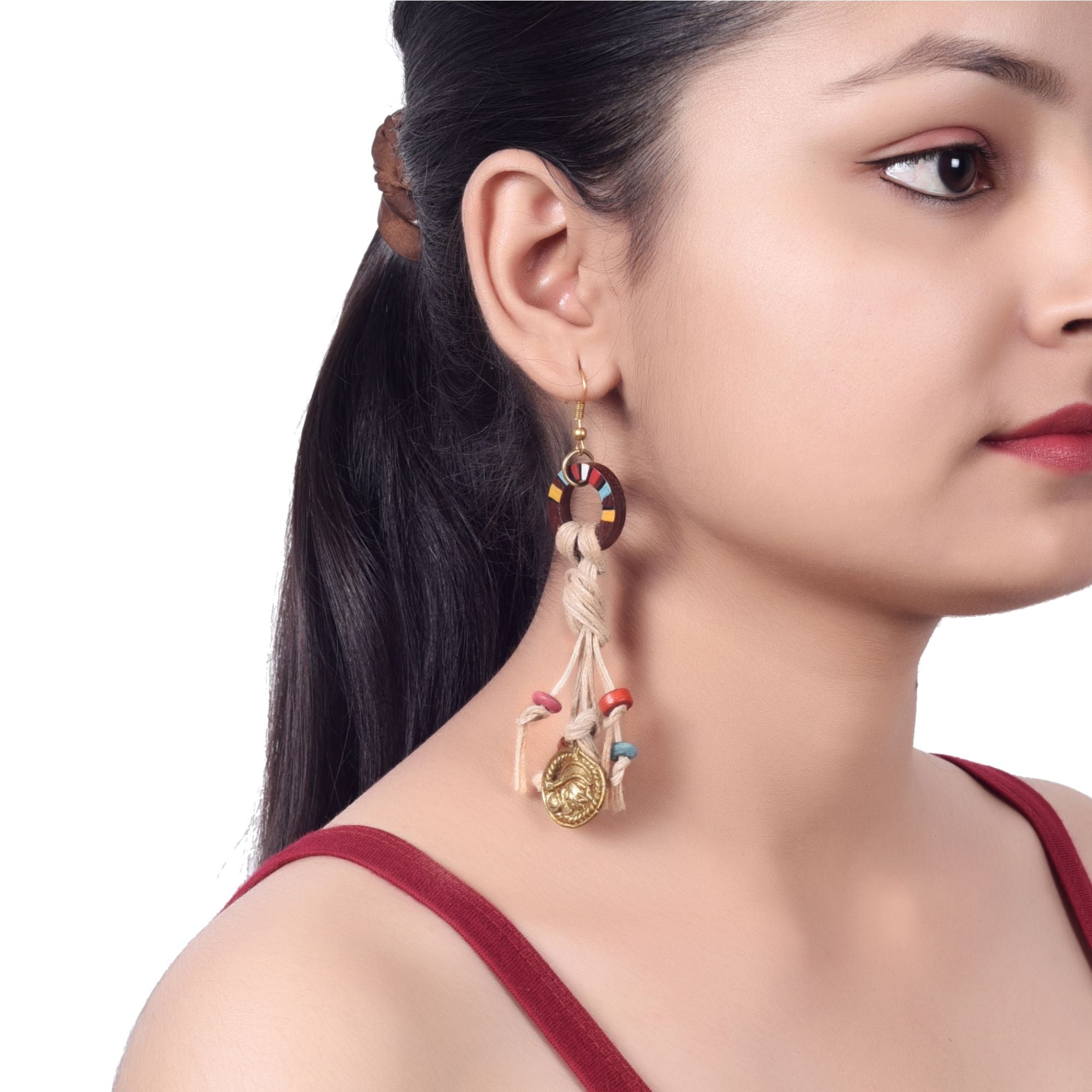 Rustic Loops: Handcrafted Wooden Earrings with Intricate Brass Figures