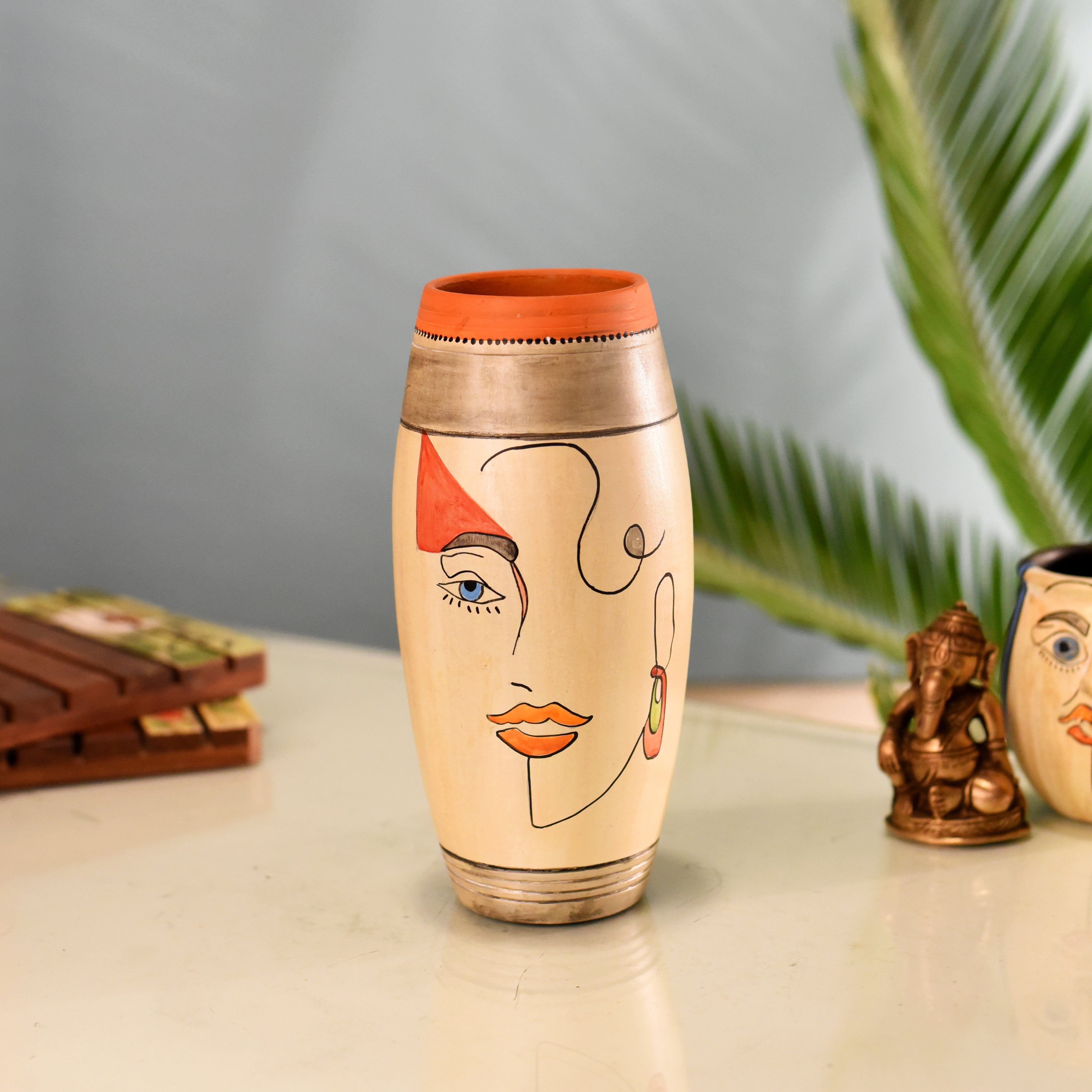 Artistic Face Motif Terracotta Jar for Boho Home Décor