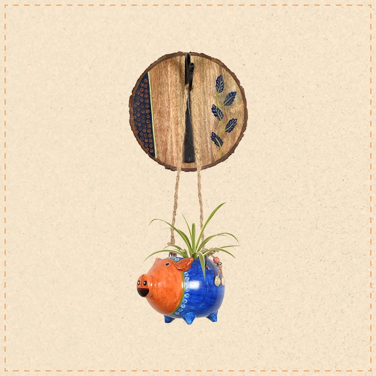 Blue Pig Earthen Planter on a Round Wall Hook