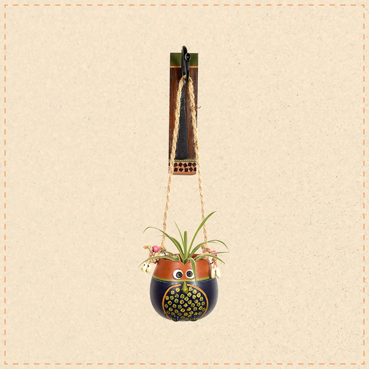 Brown-Blue Earthen Planter on a Classic Wall Hook