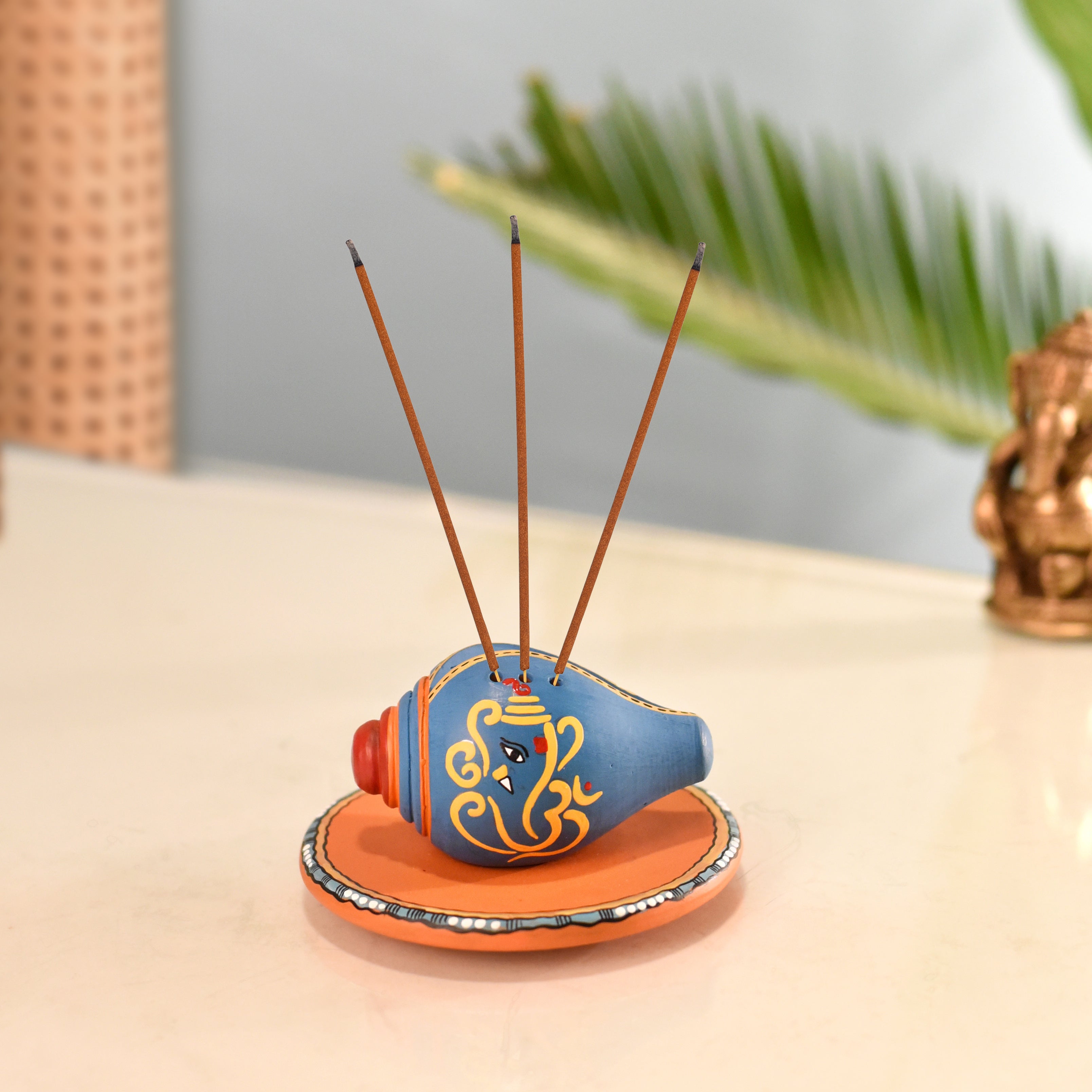 Swastika Divine Conch Incense Holder in Royal Blue color